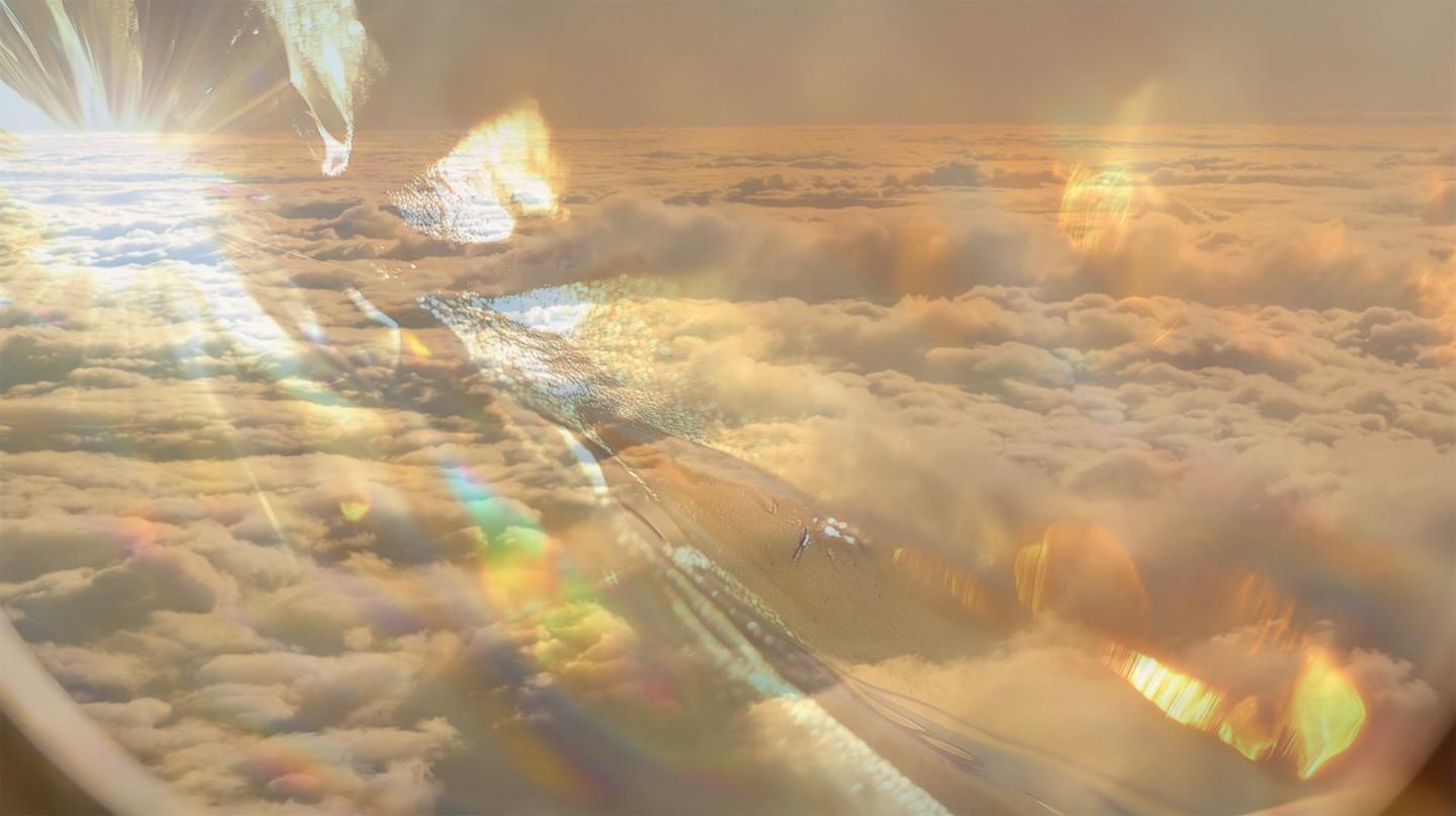 A bright sky with clouds.